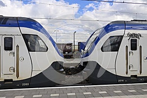 Flirt commuter trains of NS called Sprinters at station Lage Zwaluwe