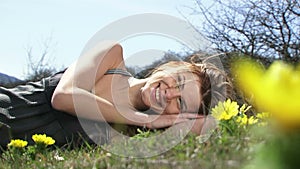 Flirting Woman Lying On Grass