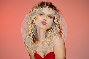 flirty curly woman with bold makeup