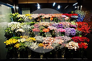 Fllower shop with colourful flowers at supermaket photo