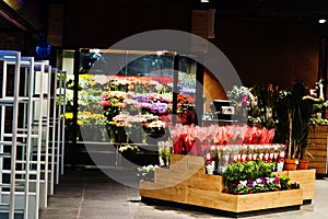 Fllower shop with colourful flowers at supermaket photo