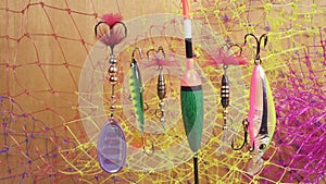 Float and baits on a fishing net background