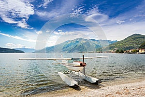 Float plane docked at a beach on Lake Como in Italy, Europe