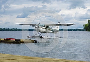 Float plane landing on a lake, Canada