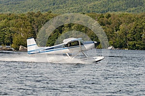 Float plane or seaplane taking off