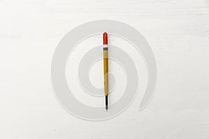 Float on a wooden surface.