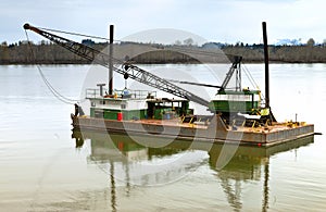 Floating barge and heavy duty crane, Oregon.