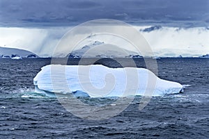 Floating Blue Iceberg Snow Glaciers Mountains Charlotte Bay Antarctica