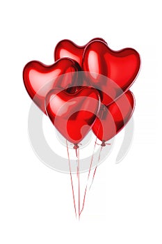 A floating bouquet of red heart shaped balloons on a white background.