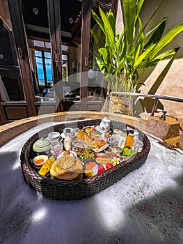 Floating breakfast in pool in Lamai beach resort in Koh Samui, Thailand