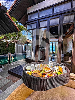 Floating breakfast in pool in Lamai beach resort in Koh Samui, Thailand