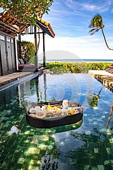 Floating breakfast in pool in Lamai beach resort in Koh Samui, Thailand