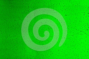 Floating bubbles in green liquid background texture.