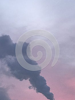 floating clouds at sunset, smoke on a beautiful