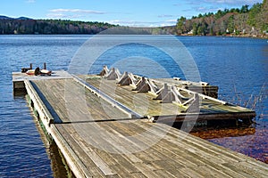 Floating dock leading to a small lake