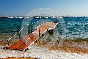 Floating dock in Tossa de Mar photo