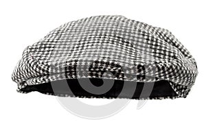 Floating grey hunting tweed flat cap or newsboy cap isolated on white background with clipping path cutout using ghost mannequin