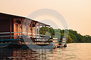 Floating house on the banks of a river in Pantanal