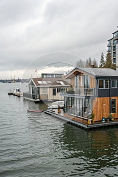 Floating houses built on water due to global warming photo