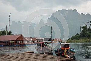 Floating houses and long tail boats at Chieou Laan lake