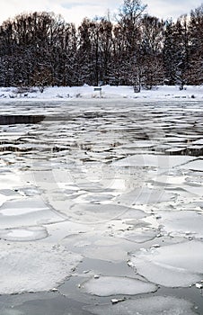 Floating ice blocks on surface of river