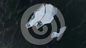 Floating ice drifts in open water, a quadrocopter. White ice floe