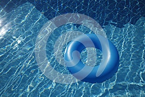 Floating inner tube in a pool