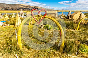 Floating Islands on Lake Titicaca Puno, Peru, South America, thatched home. Dense root that plants Khili