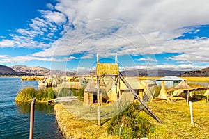 Floating Islands on Lake Titicaca Puno, Peru, South America, thatched home. Dense root that plants Khili interweave