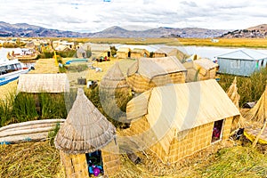 Floating Islands on Lake Titicaca Puno, Peru, South America, thatched home. Dense root that plants Khili photo