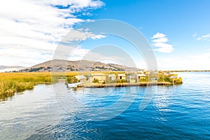 Floating Islands on Lake Titicaca Puno, Peru, South America, thatched home. Dense root that plants Khili photo