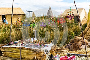 Floating Islands on Lake Titicaca Puno, Peru, South America, thatched home. photo