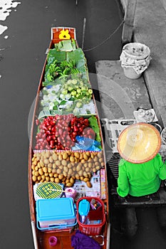 Floating market,Fruit Seller in Woodenboat, Thailand.