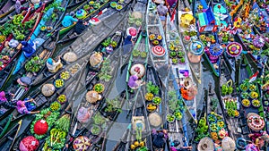 a floating market that is very crowded with visitors photo