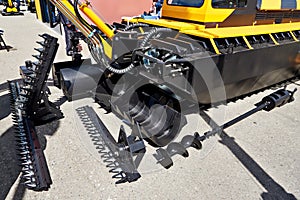 Floating mini excavator with attachments
