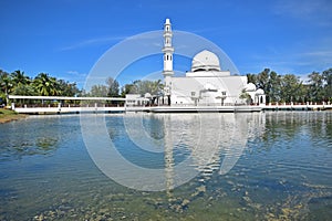 Floating mosque of Tengku Tengah Zaharah located at Kuala Ibai Lagoon, the estuary river nearby Kuala Terengganu, Malaysia photo