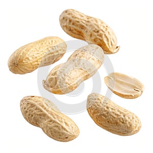 Floating peeled peanuts isolated on white background