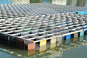 Floating pier made from chemical drums