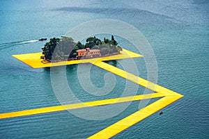 The floating piers. The artist Christo walkway on Lake Iseo St.Paul island.