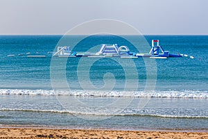 Floating playset on sea for vacation swimmers photo
