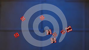 Floating Red Dice Below the Glass Table