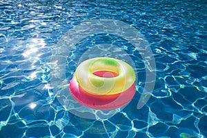 Floating rings on blue water swimpool