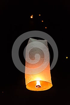 Floating sky lanterns during Loy Kratong Festival in Nan, Thailand