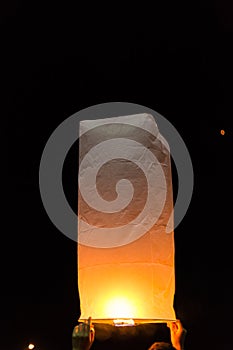 Floating sky lanterns during Loy Kratong Festival in Nan, Thailand