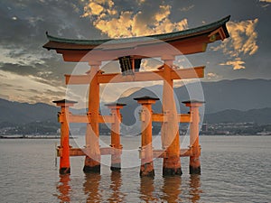 The floating torii gate at UNESCO World Heritage Itsukushima Shrine on the island of Miyajima in Japan