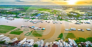 Floating village along Hau river over Vietnam border area, aerial view