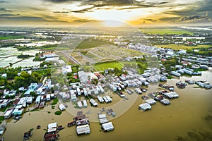 Floating village along Hau river over Vietnam border area, aerial view