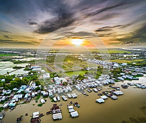 Floating village along Hau river over Vietnam border area, aerial view