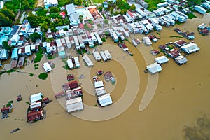 Floating village along Hau river over Vietnam border area, aerial view