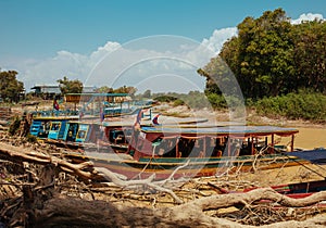 Floating Village Boats on the river in Cambodia near Pean Bang and Tonle Sap Lake